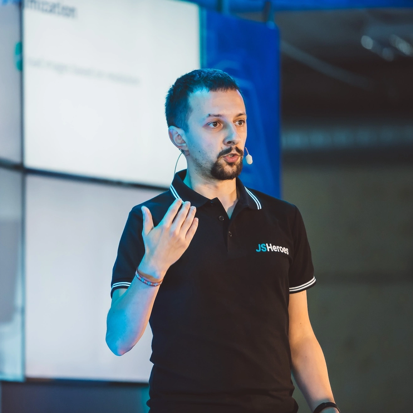 Alex Moldovan speaking at a tech event